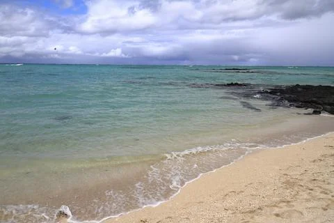 A Pristine White Sandy Beach Meets the Clear Turquoise Ocean, Mauritius Stock Photos