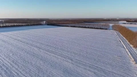 Pristine White Wilderness Aerial View of Vast Snow-Covered Land in Northern Stock Footage 328291517