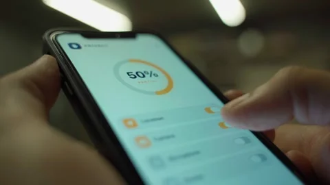 Privacy app on smartphone screen disabling microphone camera and location Stock Footage 343238468