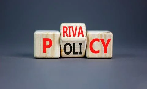 Privacy policy symbol. Concept words Privacy policy on wooden block on a be.. Stock Photos