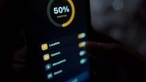 Privacy settings screen on smartphone with app permissions and toggles close-up. Stock Footage 342735715