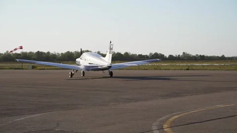 Private aircraft. The plane is preparing for take-off and is driving along the Stock Footage 153147450