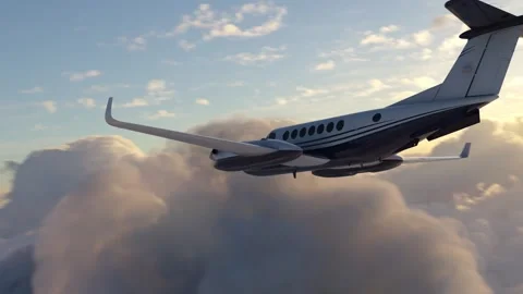 Private airplane in the clouds in the sunset Stock Footage 277570812