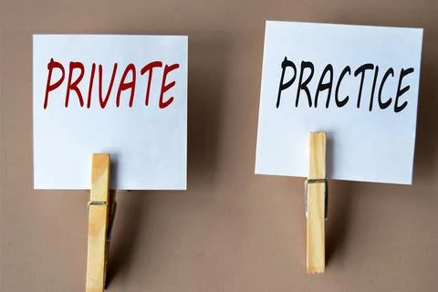 PRIVATE and PRACTICE - words on white sheets of paper with clothespins on a.. Stock Photos