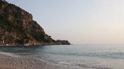 Private beach resort view with mountains and the sea at fethiye in turkey Видео 128748463