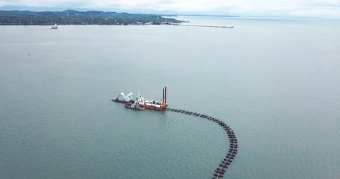 A private compay 's sand extractionship is sucking sand. Video stock 96638006