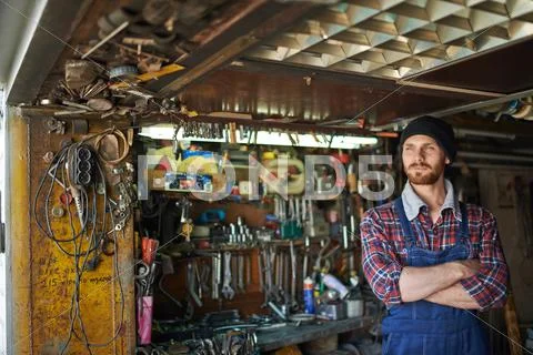 Private entrepreneur and his little workshop Stock Photos