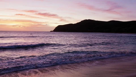 Private island beach sunset waves crashing Stock Footage 245918258