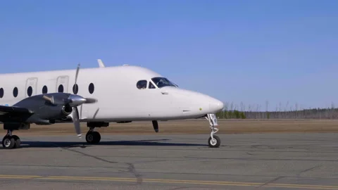 Private Jet About To Take Flight In Williams Lake Airport -  medium shot Stock Footage 153443883