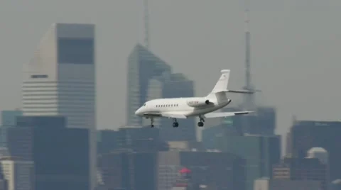 Private Jet arrival New York City LaGuardia Airport touch down Stock Footage 10909053