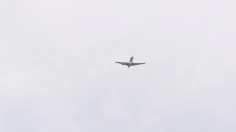 Private jet executive plane flying overhead Stock Footage 53352387