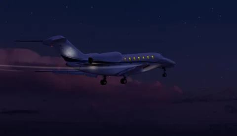Private jet flying at night Stock Photos