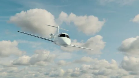 A private jet is flying in the sky among the clouds. Stock Footage 254804331