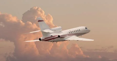 Private jet flying through clouds Stock Photos