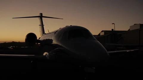 Private Jet on the ground at dawn Stock Footage 51752237