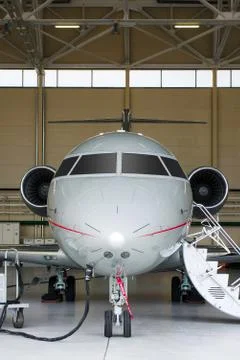 Private Jet in hangar Stock Photos