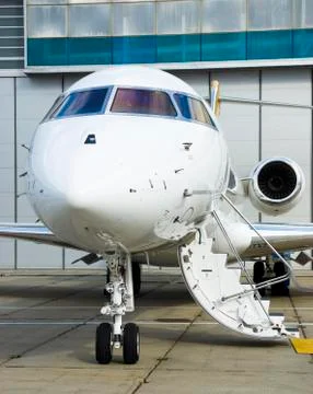 Private Jet in hangar Stock Photos