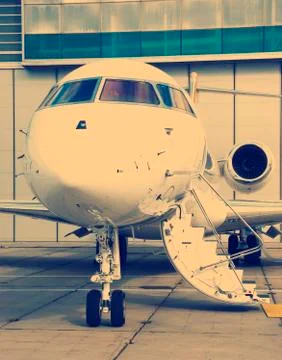 Private Jet in hangar Stock Photos