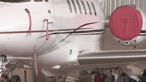 Private jet in hanger Video stock 84731480