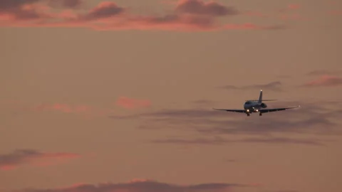 Private jet landing at sunset 스톡 동영상 270822688