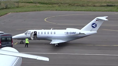private-jet-opening-door-airport-footage-250081064_iconl.jpeg