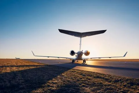 Private jet at sunset Foto stock