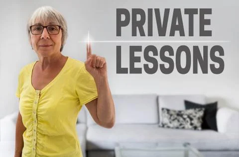 Private Lessons touchscreen is shown by senior Stock Photos