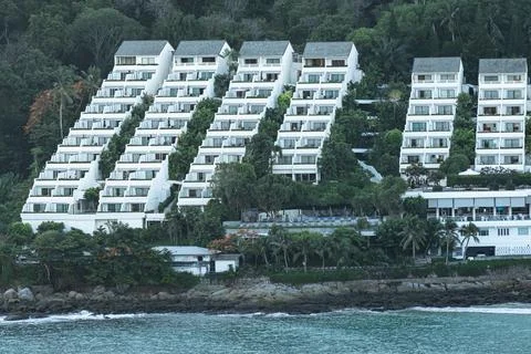 Private modern beach resort. Multi-storey villa. Luxurious resort among palm  Stock Photos