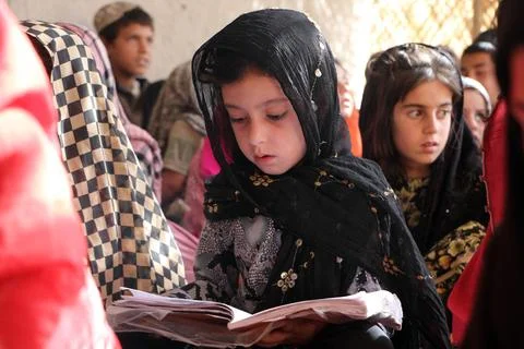 Private organization opens primary classes for children in Afghan villages, Kand Stock Photos