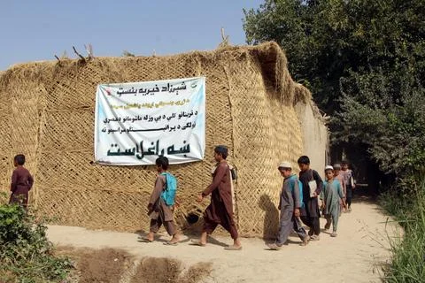 Private organization opens primary classes for children in Afghan villages, Kand Stock Photos