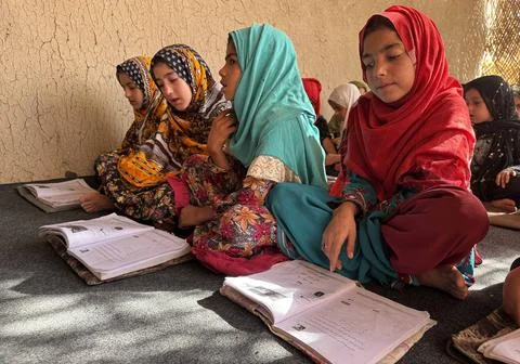 Private organization opens primary classes for children in Afghan villages, Kand Stock Photos