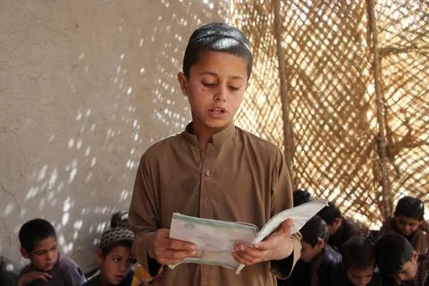 Private organization opens primary classes for children in Afghan villages, Kand Stock Photos
