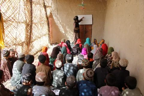 Private organization opens primary classes for children in Afghan villages, Kand Stock Photos