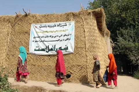Private organization opens primary classes for children in Afghan villages, Kand Stock Photos
