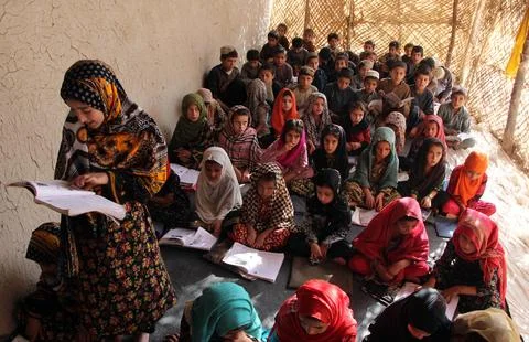 Private organization opens primary classes for children in Afghan villages, Kand Stock Photos