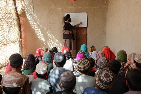 Private organization opens primary classes for children in Afghan villages, Kand Stock Photos