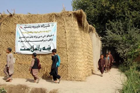 Private organization opens primary classes for children in Afghan villages, Kand Stock Photos