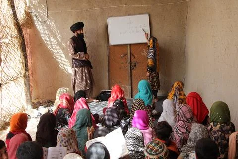 Private organization opens primary classes for children in Afghan villages, Kand Stock Photos