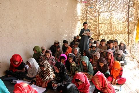 Private organization opens primary classes for children in Afghan villages, Kand Stock Photos