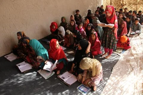 Private organization opens primary classes for children in Afghan villages, Kand Stock Photos