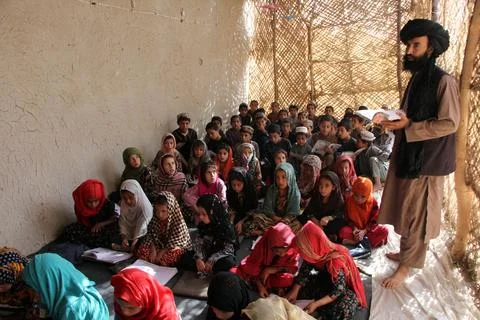 Private organization opens primary classes for children in Afghan villages, Kand Stock Photos
