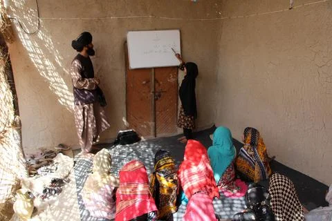 Private organization opens primary classes for children in Afghan villages, Kand Stock Photos