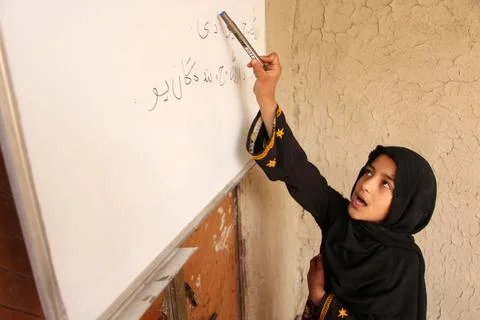 Private organization opens primary classes for children in Afghan villages, Kand Stock Photos