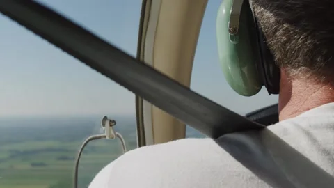 Private pilot license flying above Netherlands in summer headset david clarke Stock Footage 152933807