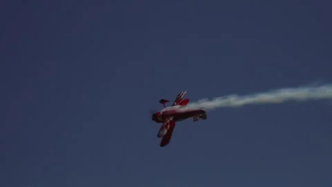 Private plane crash. A small plane during an aerobatic simulation. Stock Footage 243641998