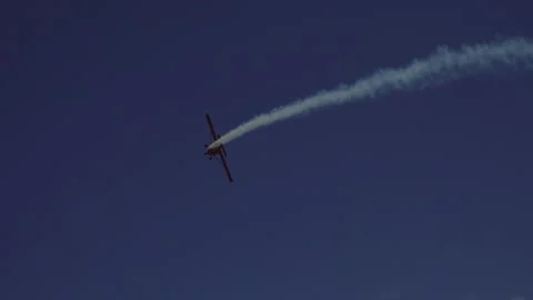 Private plane crash. A small plane during an aerobatic simulation. Stock Footage 243701179