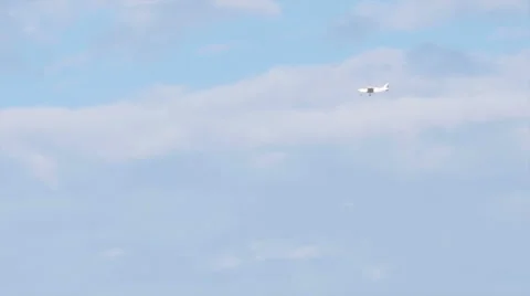 Private Plane Enjoys the Open Sky with Clouds in the Background Stock Footage 60847467
