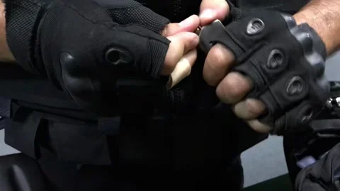 Private Security Loading a Handgun Stock Footage 315036409