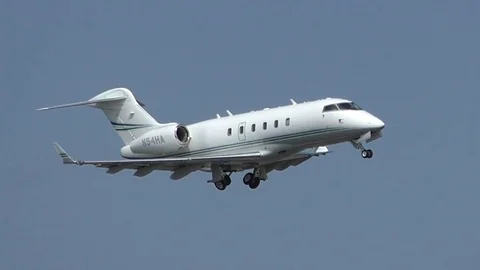 Private small jet plane takes off from the airport, slow motion Stock Footage 70754207