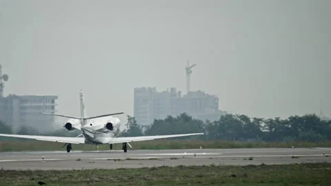 A private small plane takes off from the runway Vídeos de archivo 159504005